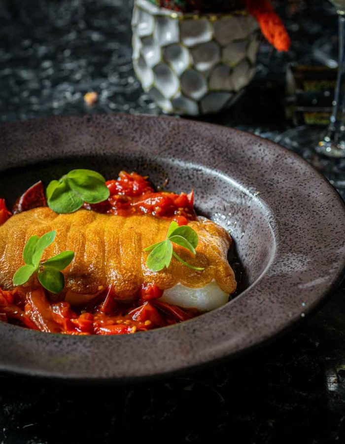 Bacalao gratinado con muselina de ajo y tomate cherry	| 31€